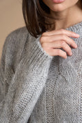 Pull paillettes a trecce