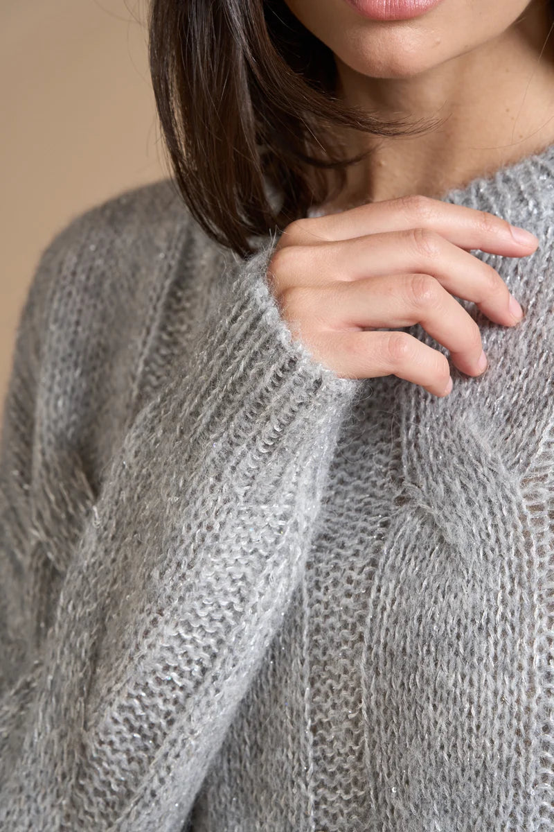 Pull paillettes a trecce