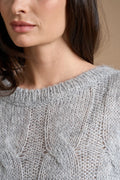 Pull paillettes a trecce