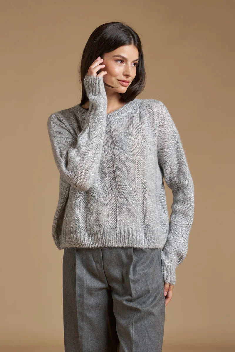 Pull paillettes a trecce