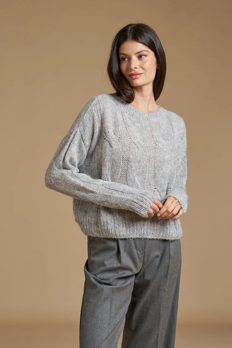 Pull paillettes a trecce