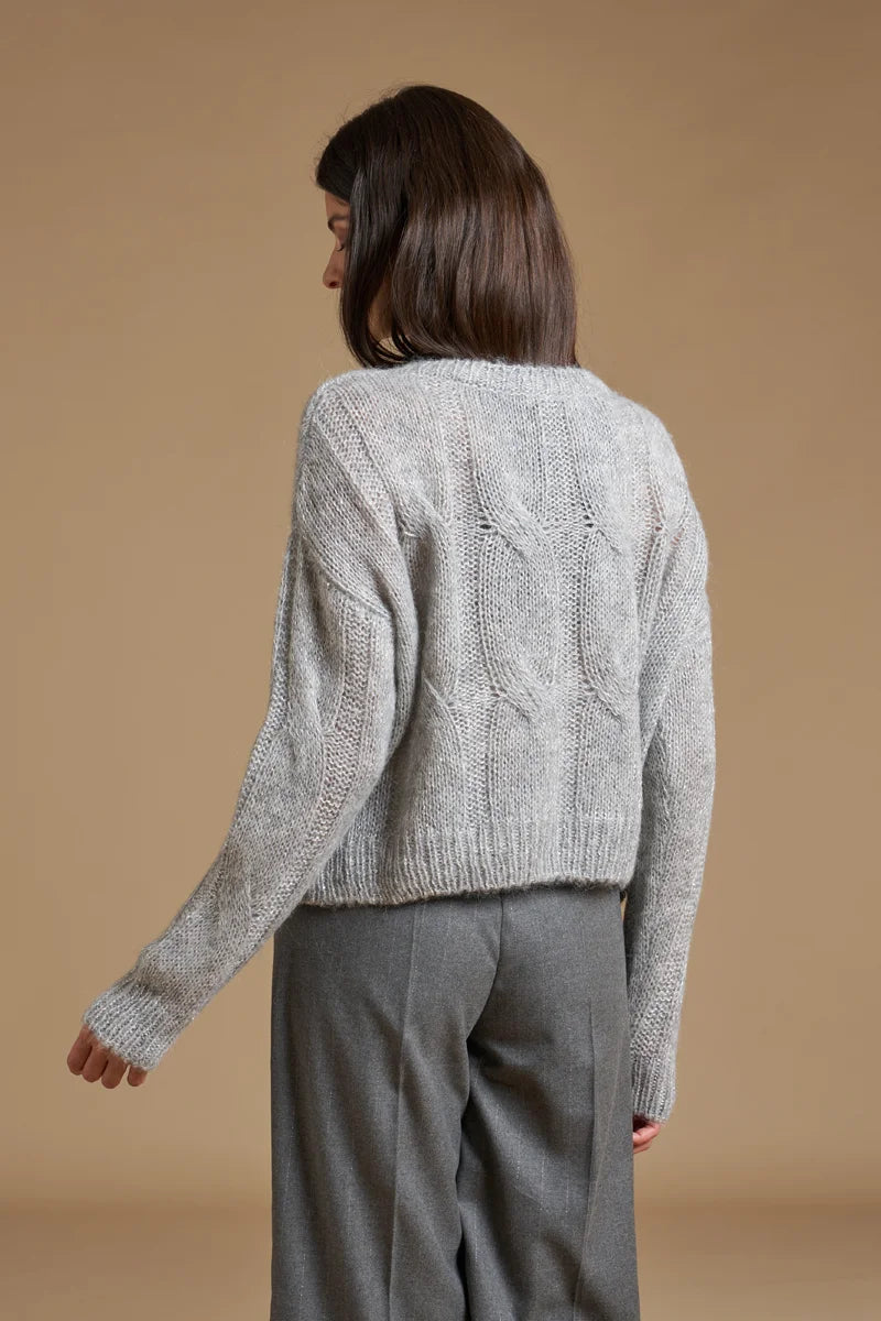 Pull paillettes a trecce