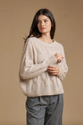 Pull paillettes a trecce