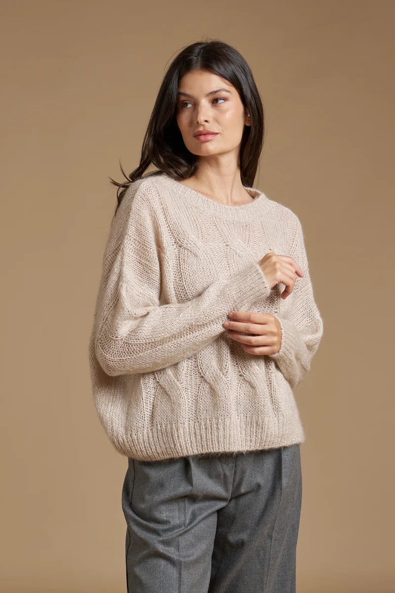 Pull paillettes a trecce