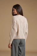 Pull paillettes a trecce